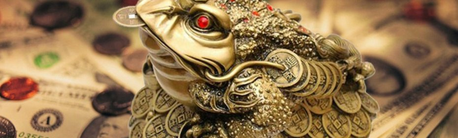 A TOAD dengan duit syiling di mulut - jimat yang menarik wang